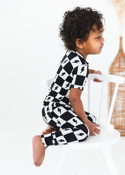 Checkered lightning bamboo two piece pajama set for babies and toddlers, both boys and girls.