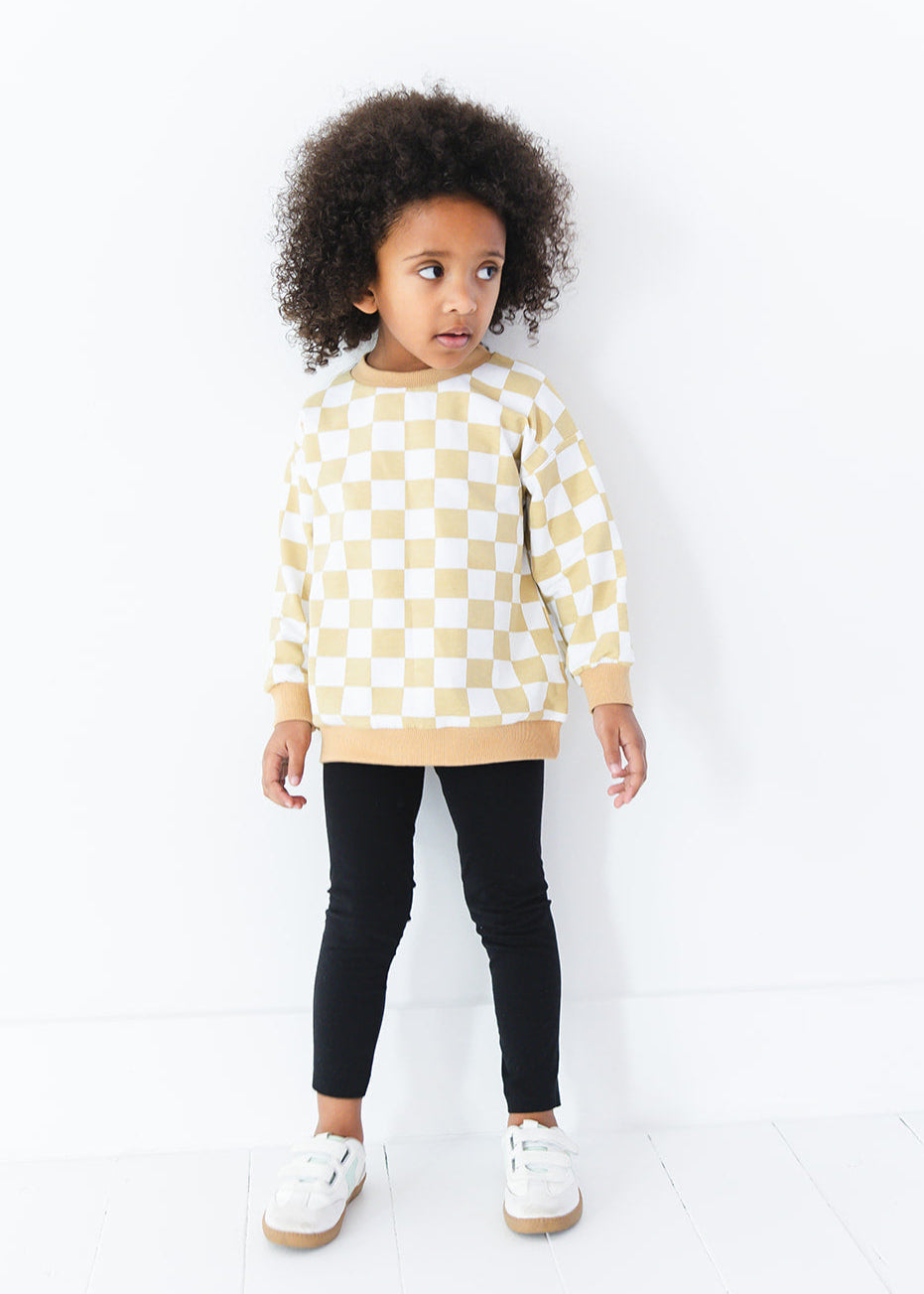 Yellow checkered organic cotton sweater for baby and toddler boys and girls.