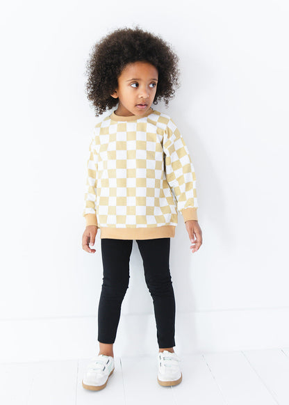 Yellow checkered organic cotton sweater for baby and toddler boys and girls.