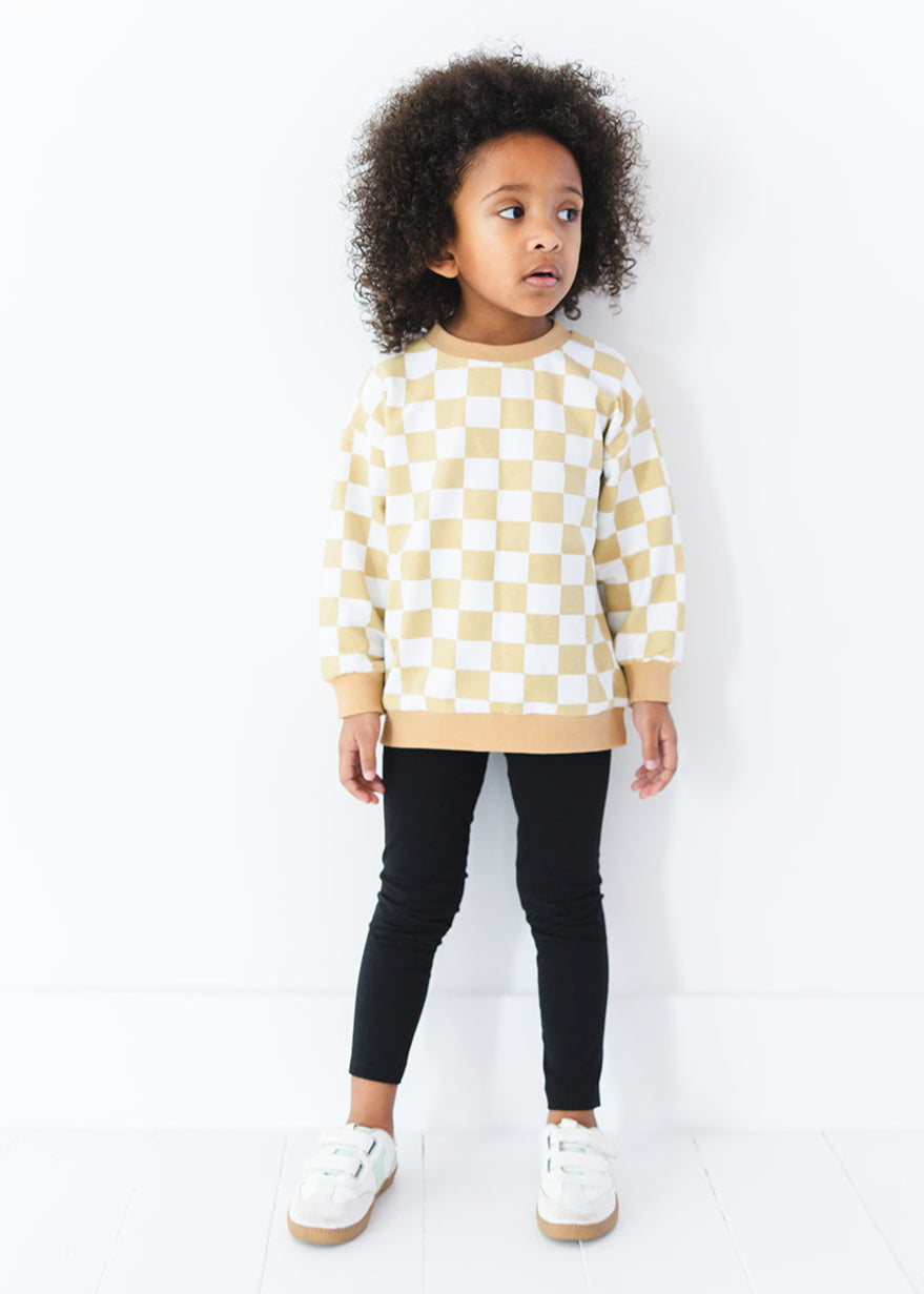 Yellow checkered organic cotton sweater for baby and toddler boys and girls.