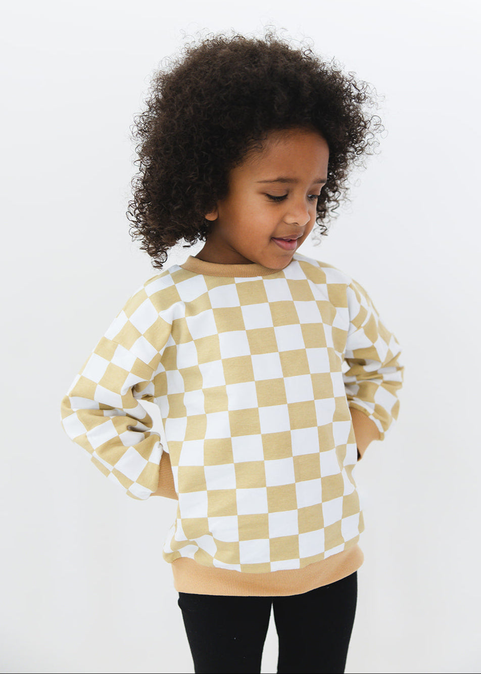 Yellow checkered organic cotton sweater for baby and toddler boys and girls.