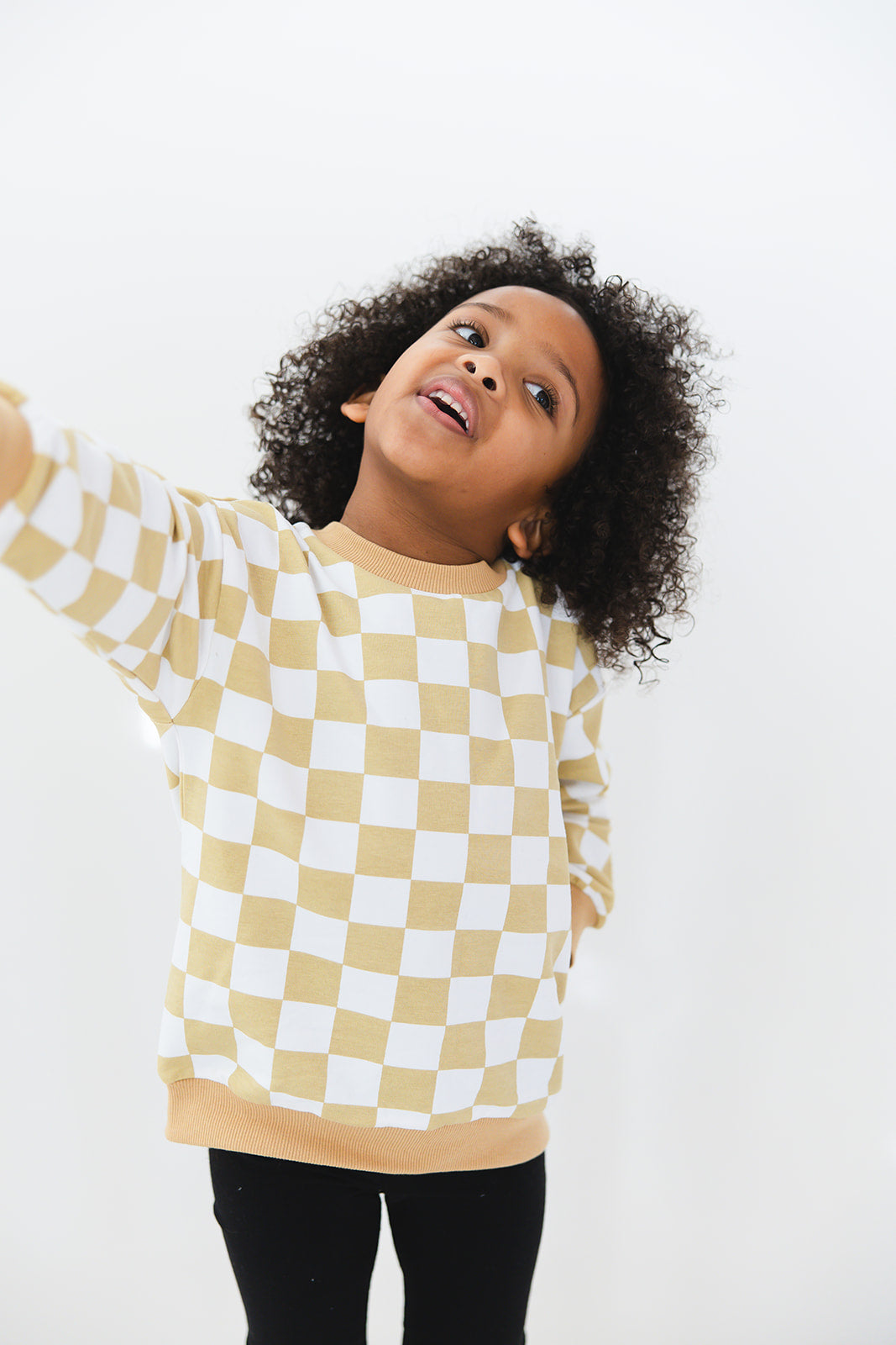 Yellow checkered organic cotton sweater for baby and toddler boys and girls.