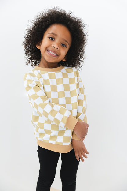 Yellow checkered organic cotton sweater for baby and toddler boys and girls.