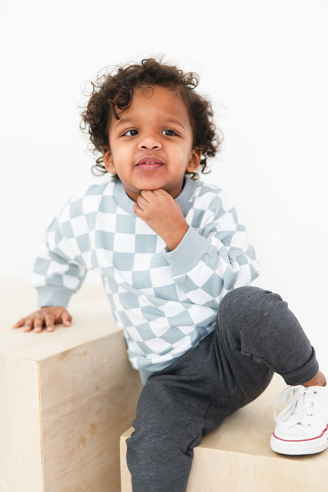 Blue checkered organic cotton sweater for baby and toddler boys and girls.