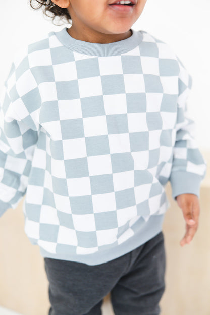 Blue checkered organic cotton sweater for baby and toddler boys and girls.