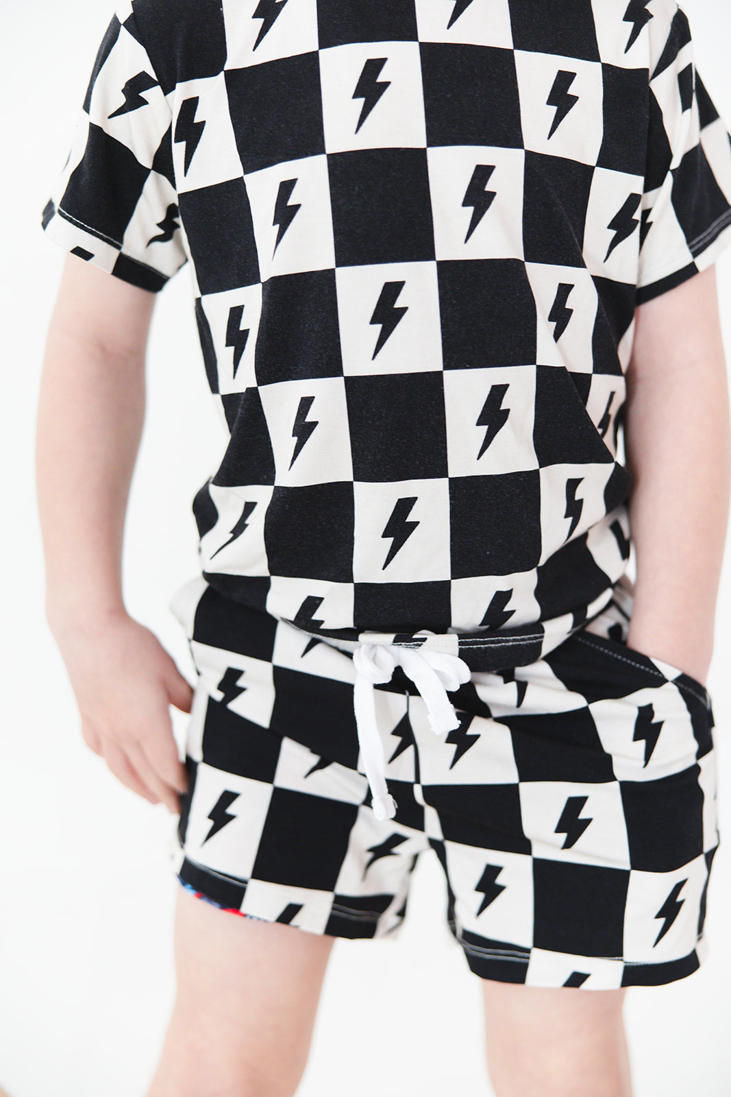 Checkered lightning black and white bamboo shorts and shirt set for babies and toddlers, both boys and girls.