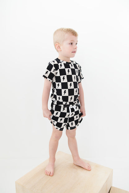 Checkered lightning black and white bamboo shorts and shirt set for babies and toddlers, both boys and girls.