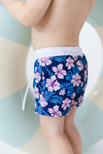 Floral boy's swim shorts with adjustable waistband. Baby, toddler and little boy swim trunks. Matching sibling swim.