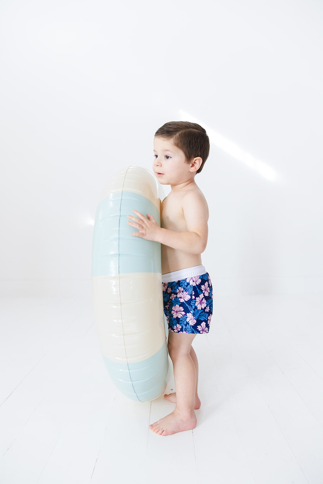 Floral boy's swim shorts with adjustable waistband. Baby, toddler and little boy swim trunks. Matching sibling swim.