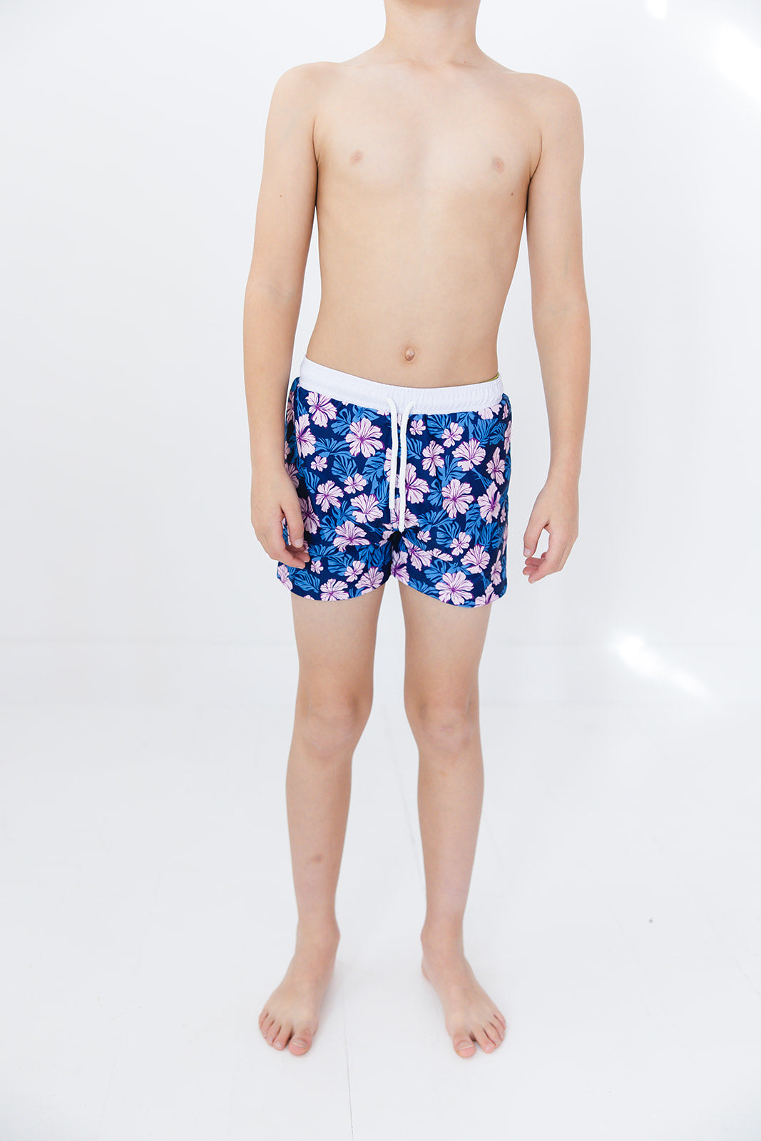 Floral boy's swim shorts with adjustable waistband. Baby, toddler and little boy swim trunks. Matching sibling swim.