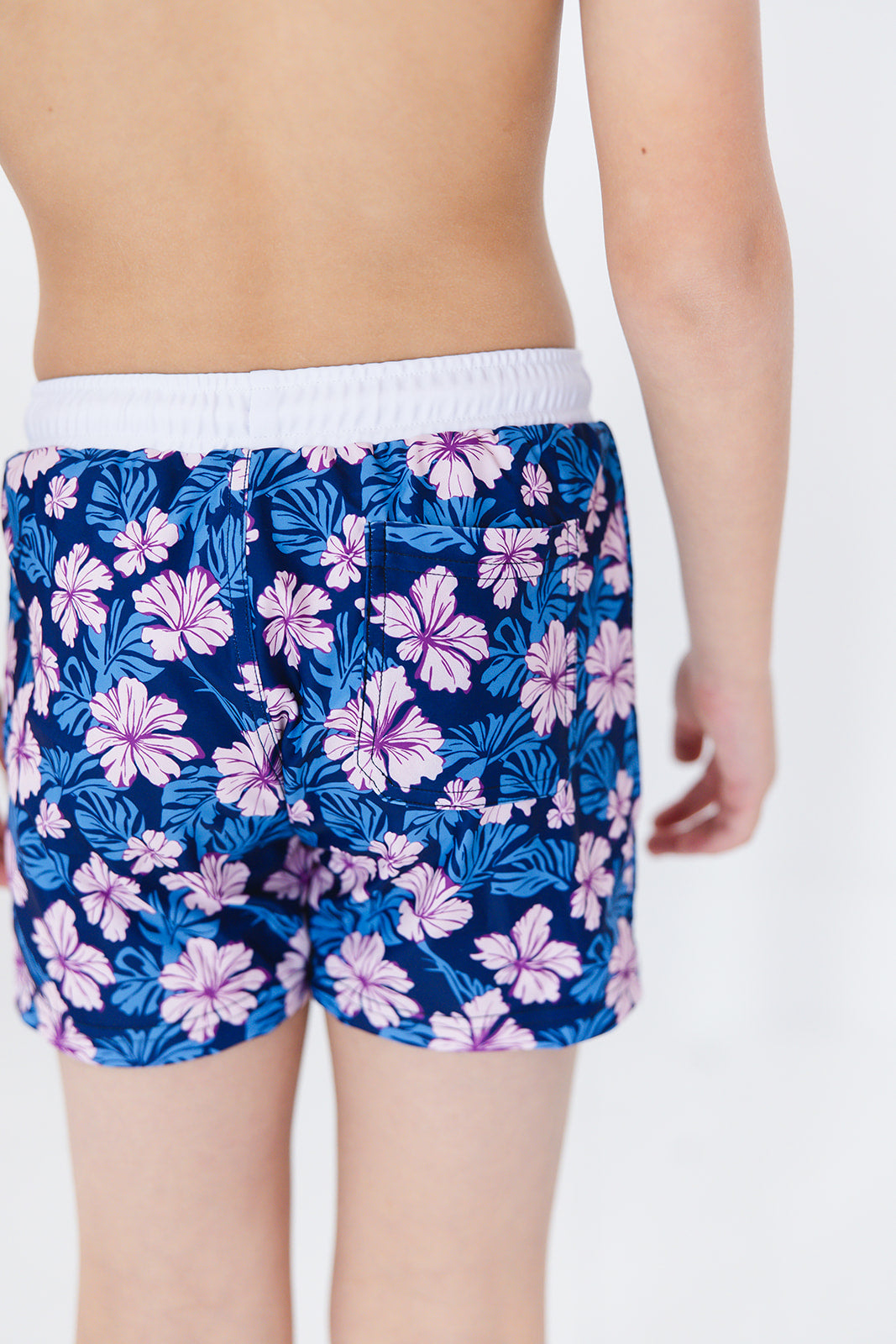 Floral boy's swim shorts with adjustable waistband. Baby, toddler and little boy swim trunks. Matching sibling swim.