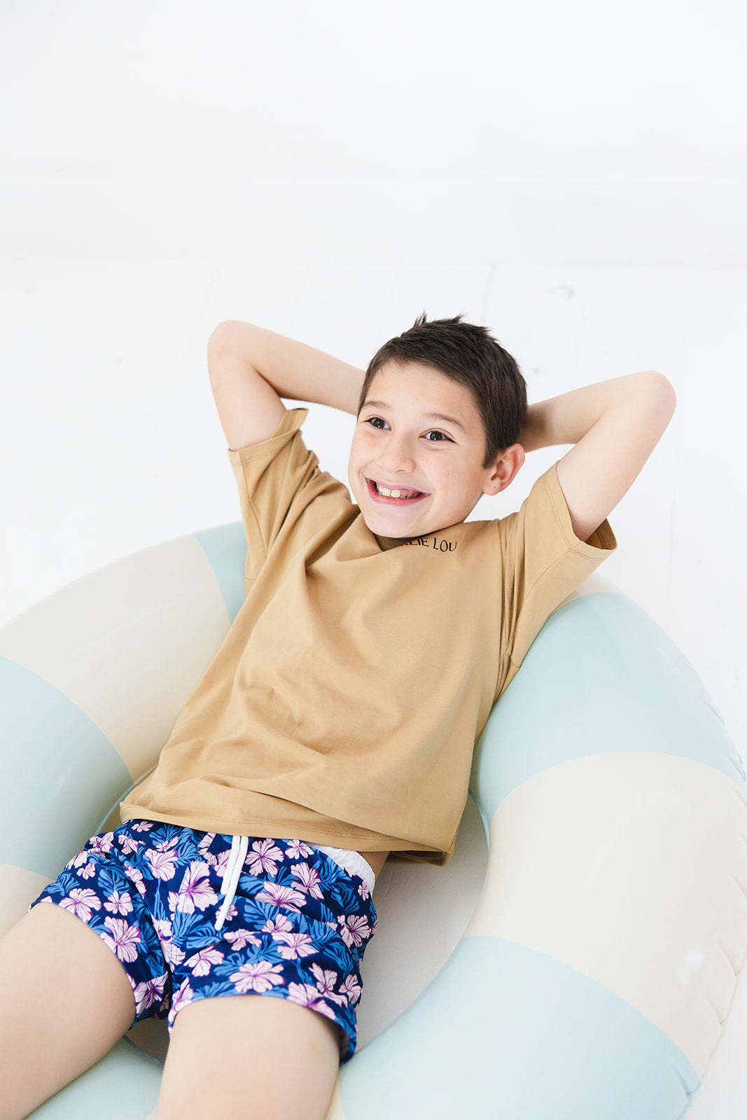 Floral boy's swim shorts with adjustable waistband. Baby, toddler and little boy swim trunks. Matching sibling swim.