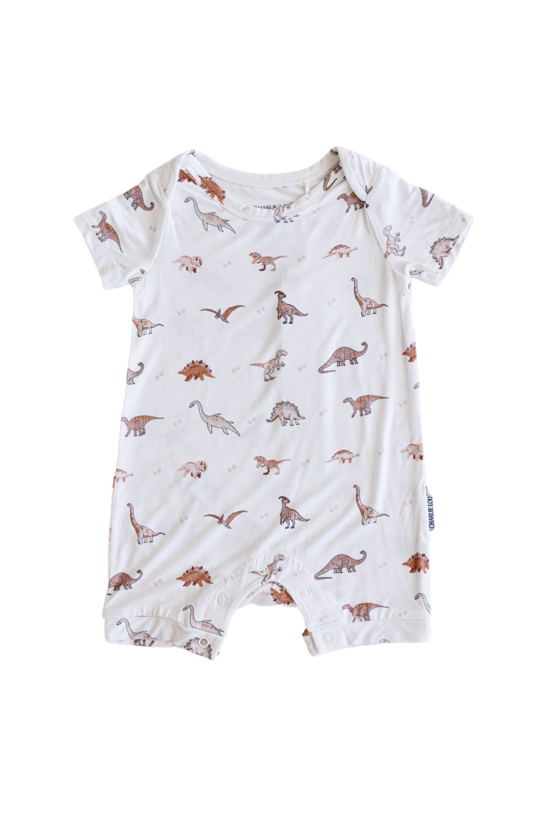 Gender neutral short sleeve romper with crotch snaps made from bamboo with neutral dinosaur print for boys and girls.