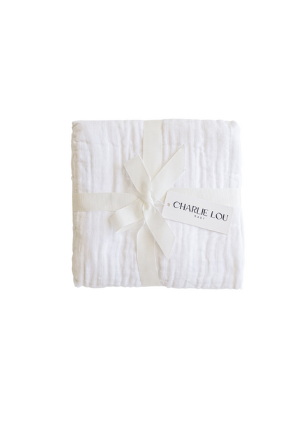 White 100% cotton muslin quilt, blanket or towel for baby girls, baby boys or toddlers.