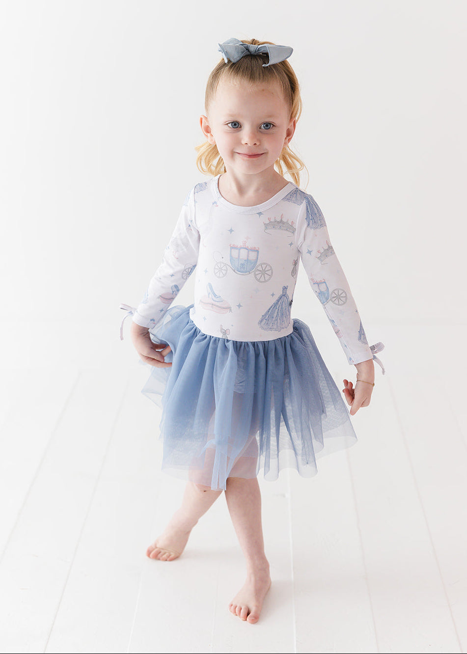 Bamboo tulle dress with bodysuit underneath. Print is vintage Disney Cinderella.