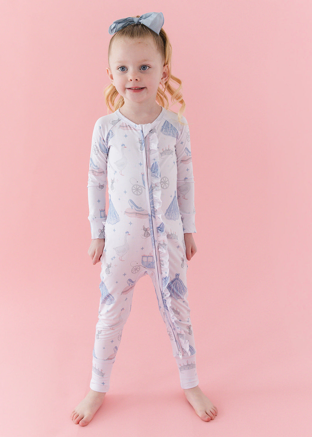 Bamboo convertible double zipper romper with hand and foot cuffs. Zippy has a vintage Disney Cinderella print on it.