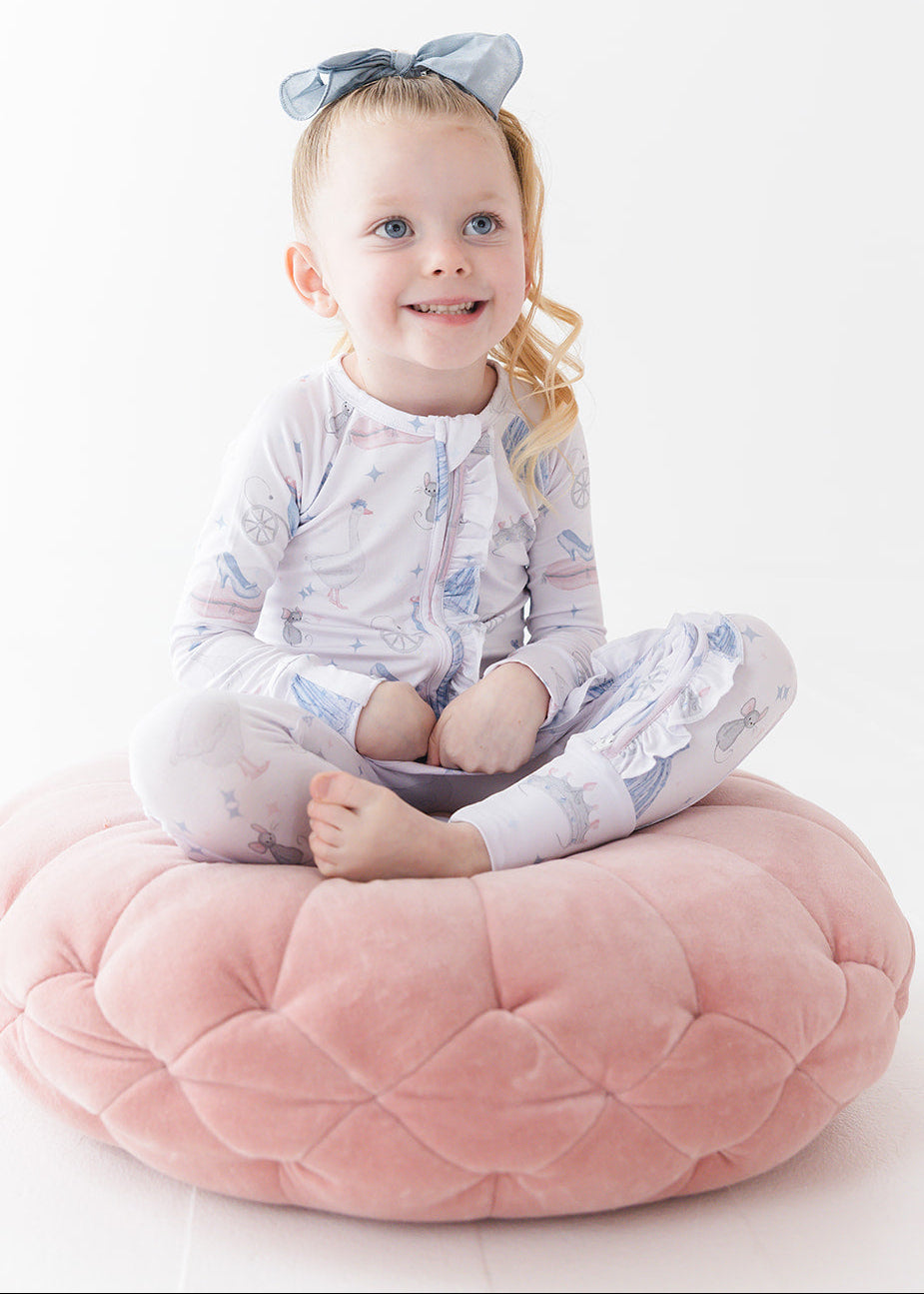 Bamboo convertible double zipper romper with hand and foot cuffs. Zippy has a vintage Disney Cinderella print on it.