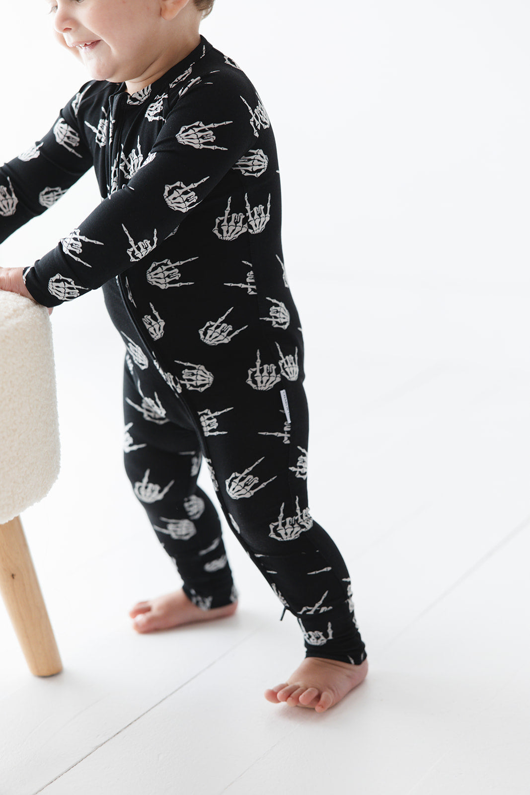 Rock N' Roll Skeleton bamboo zippy convertible romper.