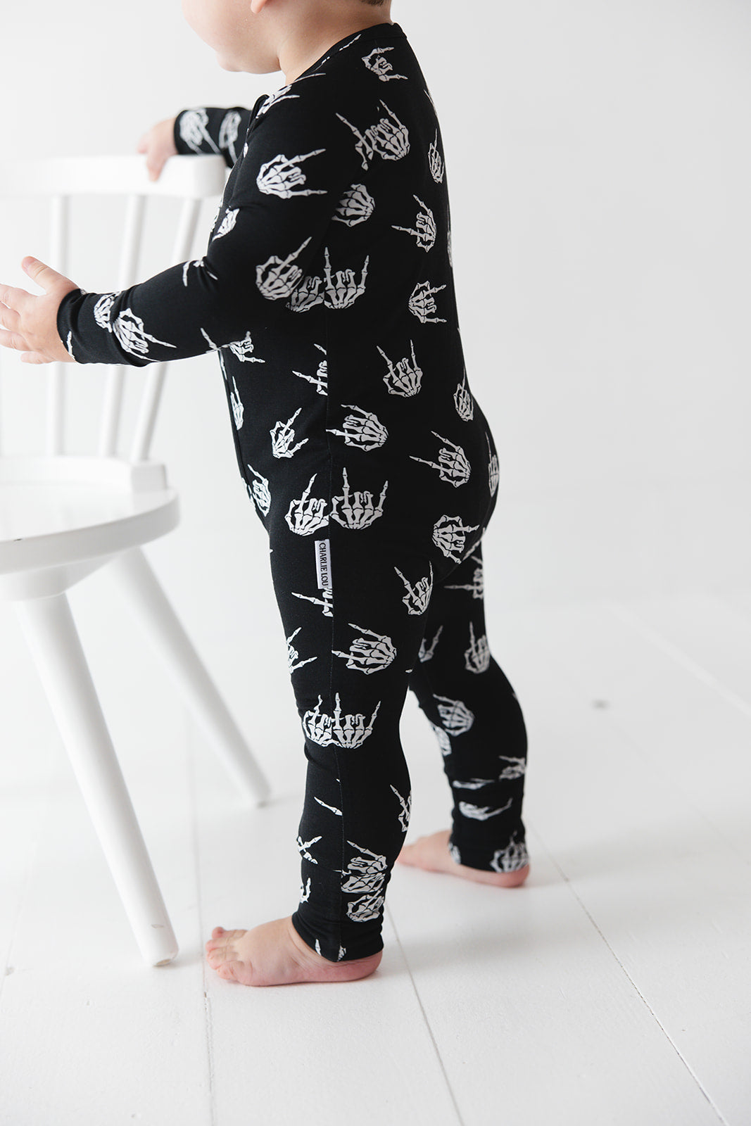 Rock N' Roll Skeleton bamboo zippy convertible romper.