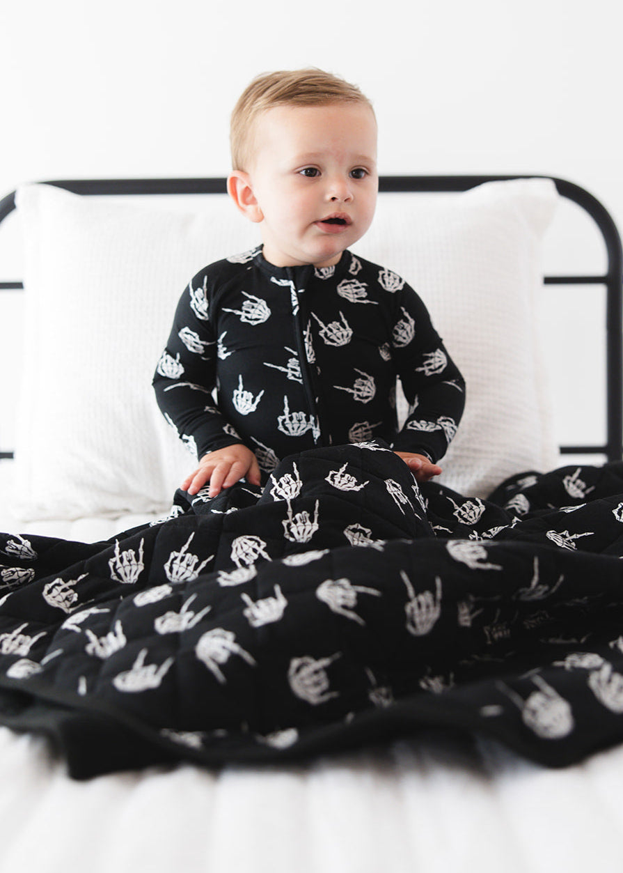 Rock N' Roll Skeleton bamboo zippy convertible romper.