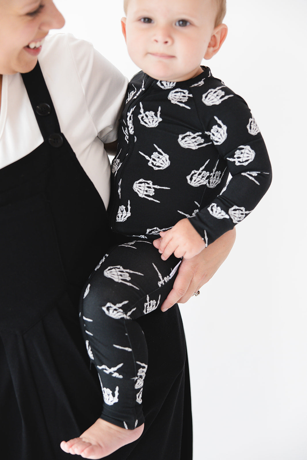 Rock N' Roll Skeleton bamboo zippy convertible romper.
