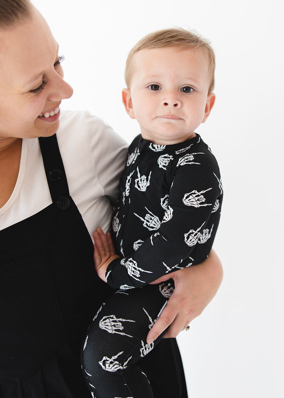 Rock N' Roll Skeleton bamboo zippy convertible romper.