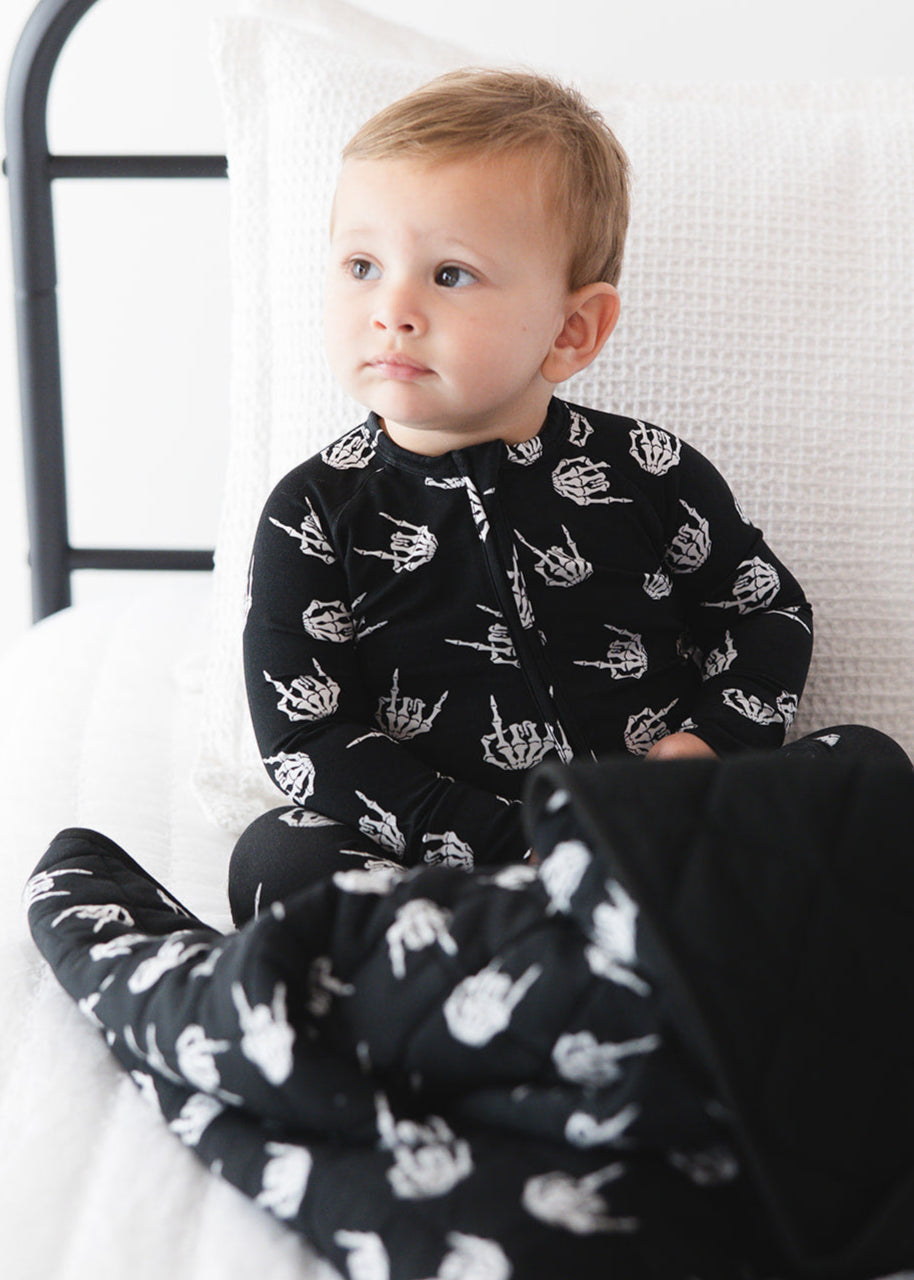 Rock N' Roll Skeleton bamboo zippy convertible romper.