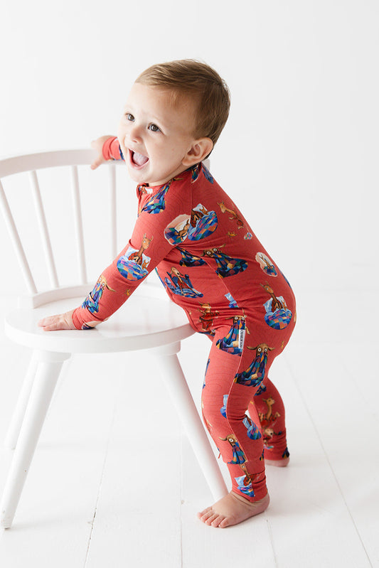 Bamboo convertible romper with hand and foot cuffs for babies and toddlers, both boys and girls. Print features a red background with Llama Llama Red Pajama.