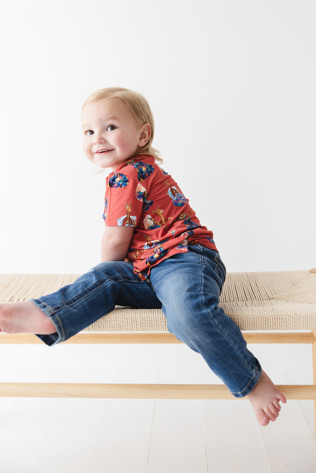 Bamboo T-Shirt for babies and toddlers, both boys and girls. Print features a red background with Llama Llama Red Pajama.
