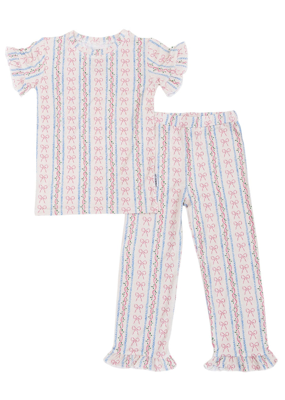 Vintage and dainty floral bow bamboo pajama set with ruffles for toddler girls.