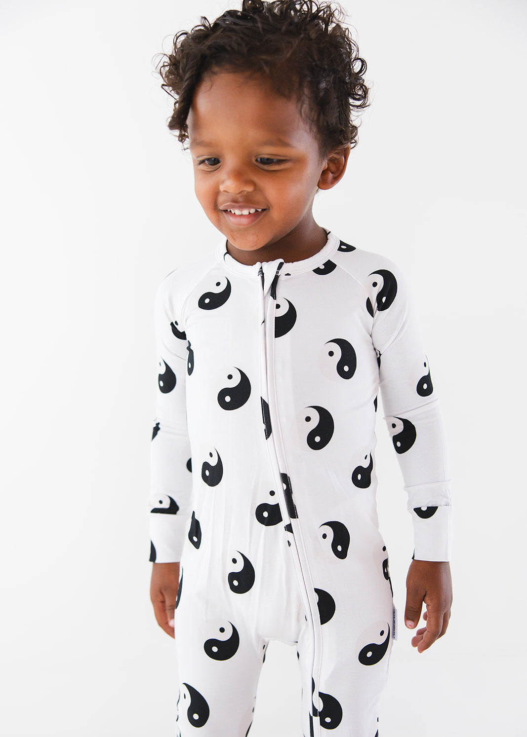 Bamboo convertible romper zippy with yin and yang print.