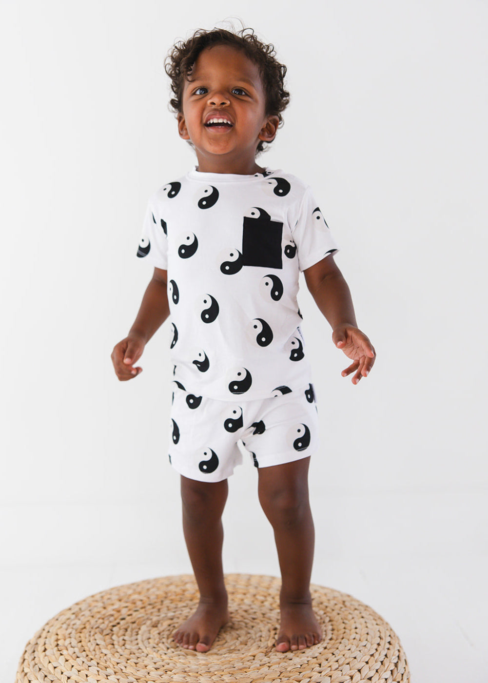 Bamboo shorts and t-shirt set with adjustable drawstring and pockets featuring a yin & yang print for baby, toddler and little boys.