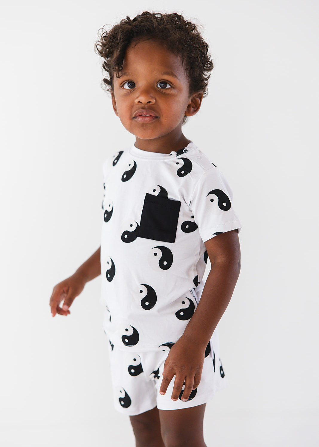 Bamboo shorts and t-shirt set with adjustable drawstring and pockets featuring a yin & yang print for baby, toddler and little boys.