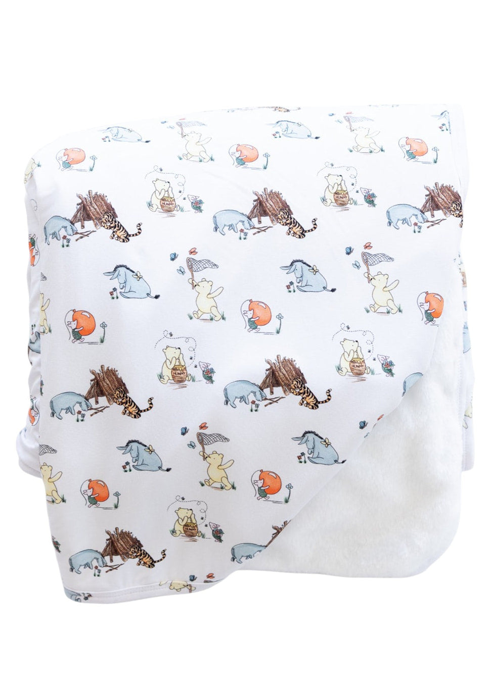 Winnie the Pooh plush bamboo blanket.