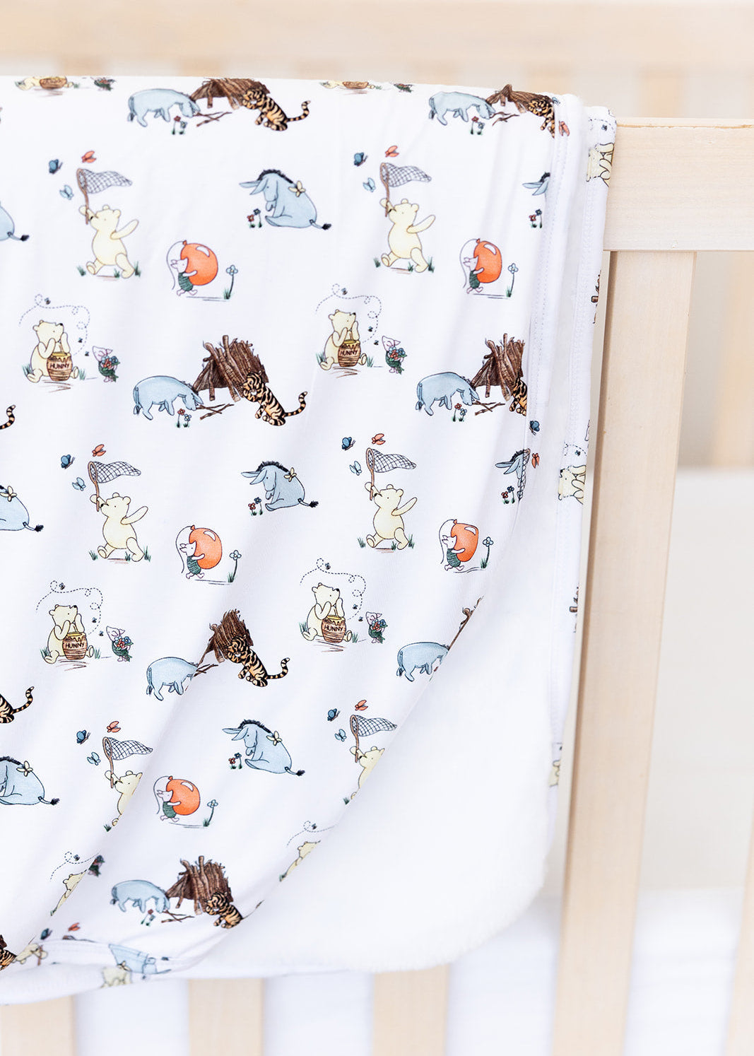 Winnie the Pooh plush bamboo blanket.