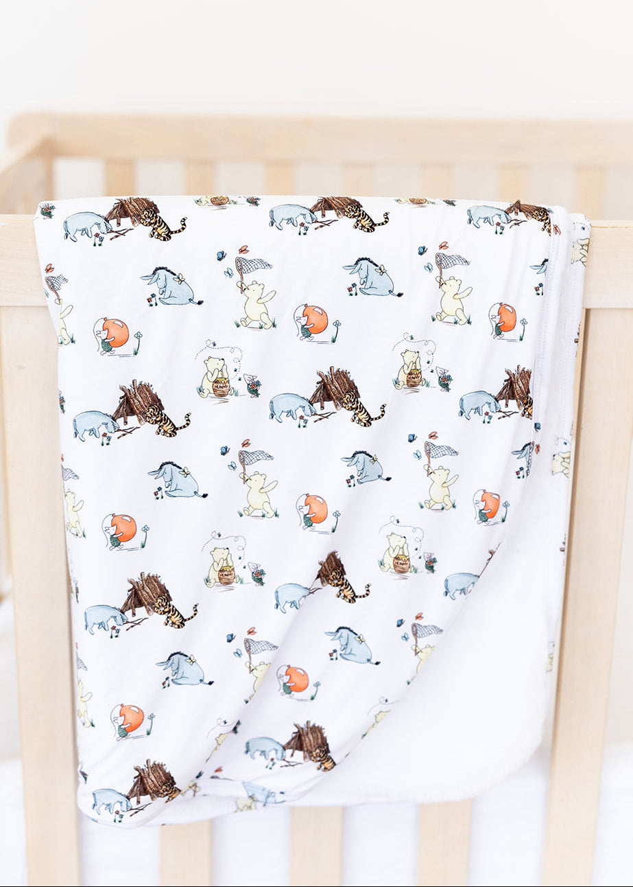 Winnie the Pooh plush bamboo blanket.