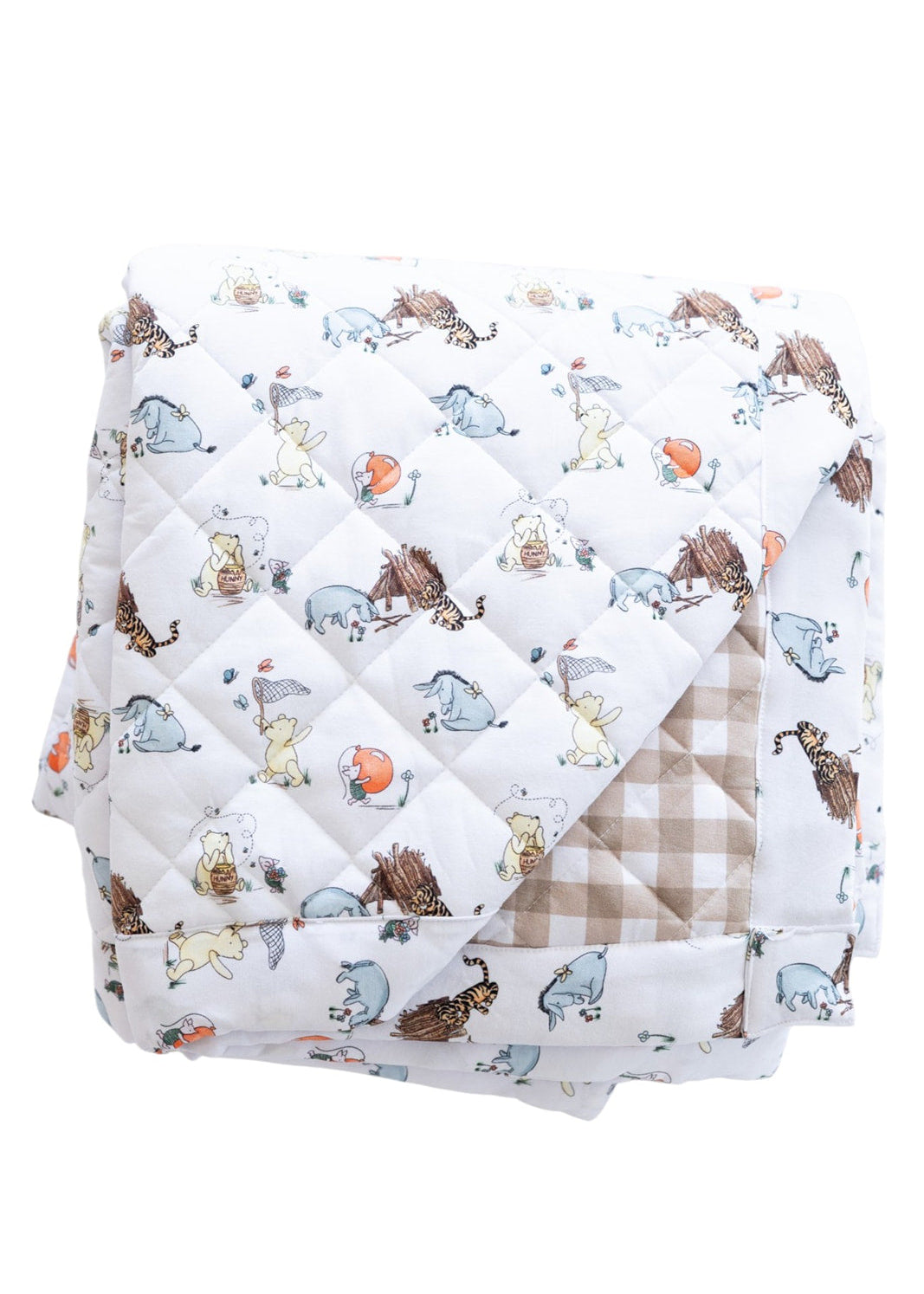 Winnie the Pooh and gingham bamboo quilted blanket.