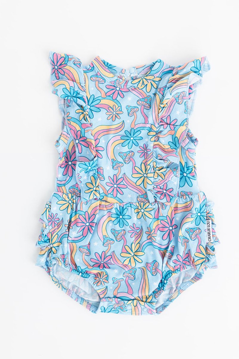 Bamboo bubble ruffle bodysuit with a groovy, hippie, 70’s style print that has florals and mushrooms on it for baby girls. This bamboo fabric has blues, pinks and oranges on it and is hypoallergenic, has UV protection and is temperature regulating. 