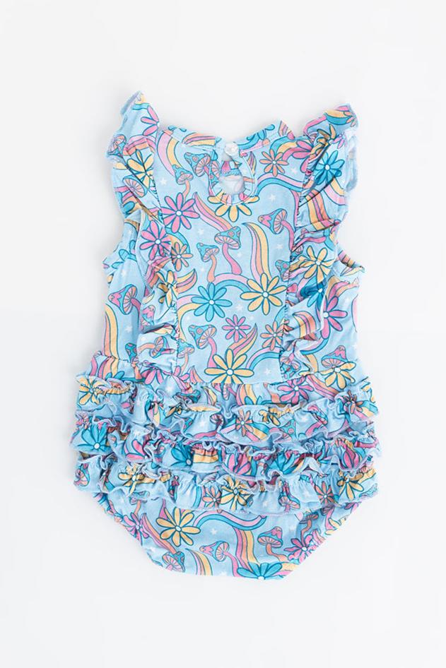 Bamboo bubble ruffle bodysuit with a groovy, hippie, 70’s style print that has florals and mushrooms on it for baby girls. This bamboo fabric has blues, pinks and oranges on it and is hypoallergenic, has UV protection and is temperature regulating. 