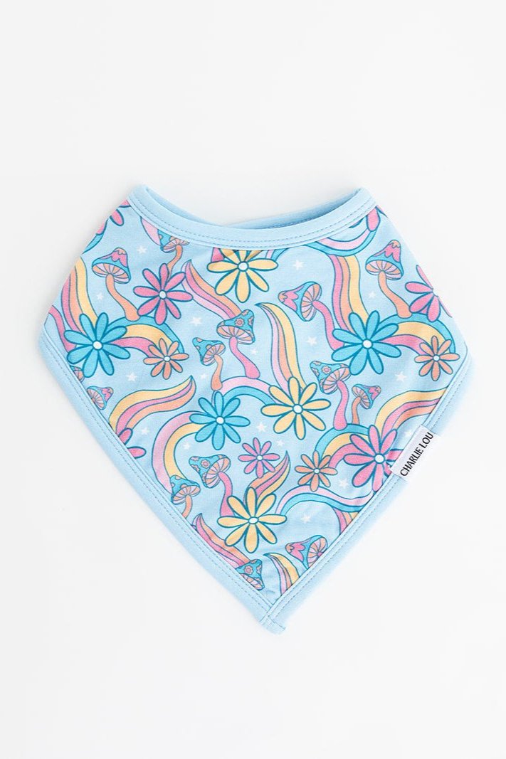 Groovy, hippie, 70’s print on a bamboo snap bib with terry cloth filling. Blue, pink and orange floral and mushroom bamboo bib for baby girls.