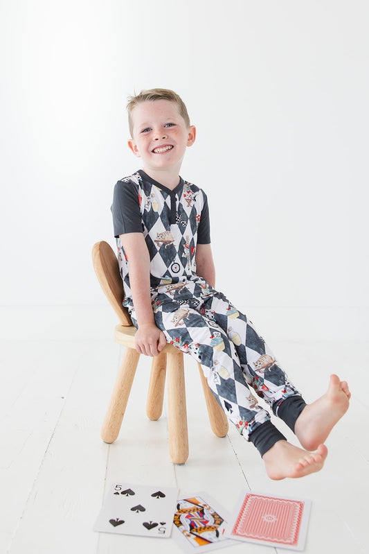 Vintage Alice in Wonderland bamboo pajama set for toddler boys and girls. Gender neutral bamboo pajamas with button down collar and back pocket for summer and winter.