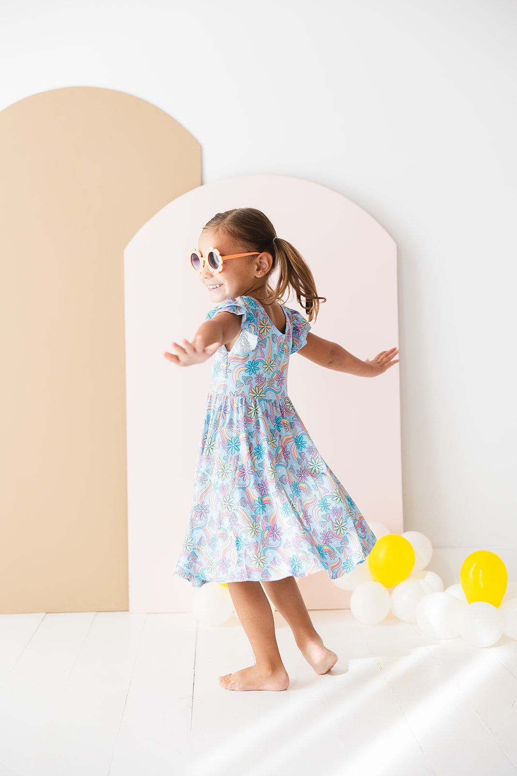 Bamboo twirl dress for baby girls and toddlers with mushrooms and florals.