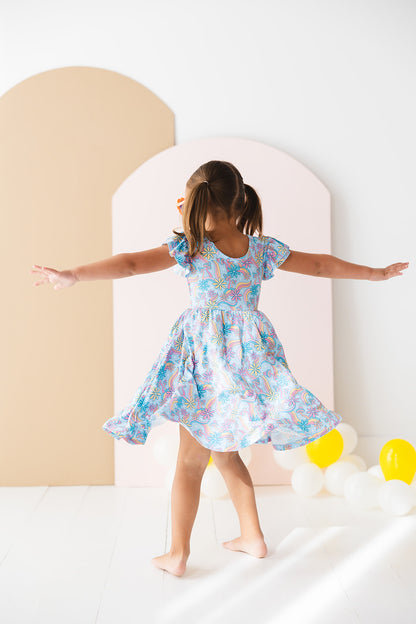 Bamboo twirl dress for baby girls and toddlers with mushrooms and florals.