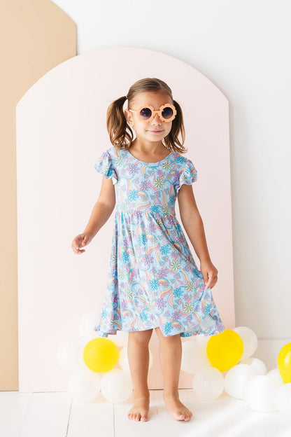 Bamboo twirl dress for baby girls and toddlers with mushrooms and florals.