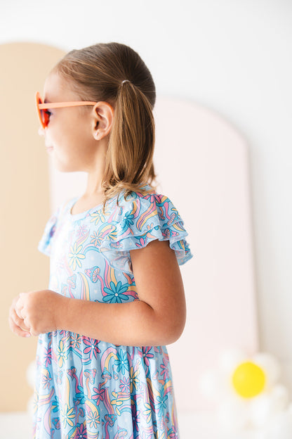 Bamboo twirl dress for baby girls and toddlers with mushrooms and florals.