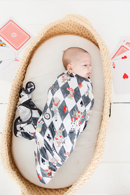 Vintage Alice in Wonderland gender neutral bamboo swaddle. Stretchy swaddle with Disney print for baby boys and girls.