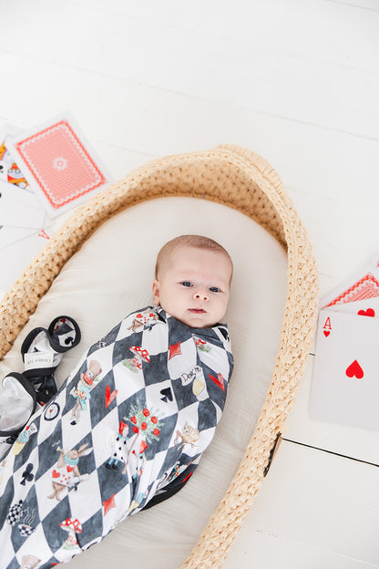 Vintage Alice in Wonderland gender neutral bamboo swaddle. Stretchy swaddle with Disney print for baby boys and girls.