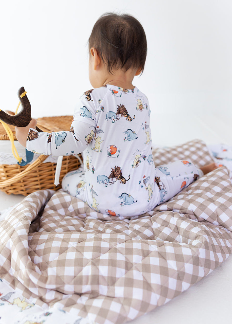 Winnie the Pooh and gingham bamboo quilted blanket.