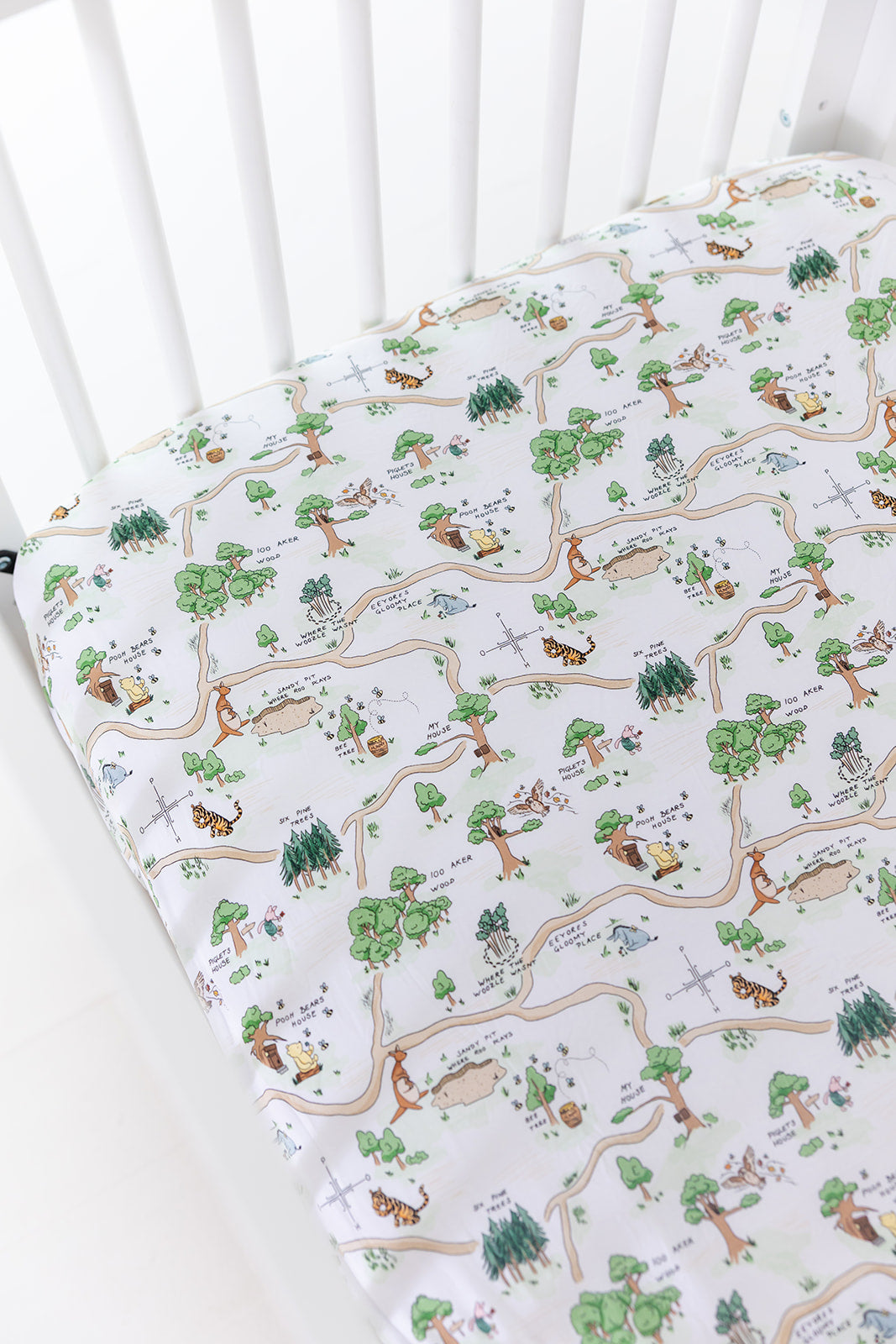 Winnie the Pooh Hundred Acre Wood bamboo crib sheet.