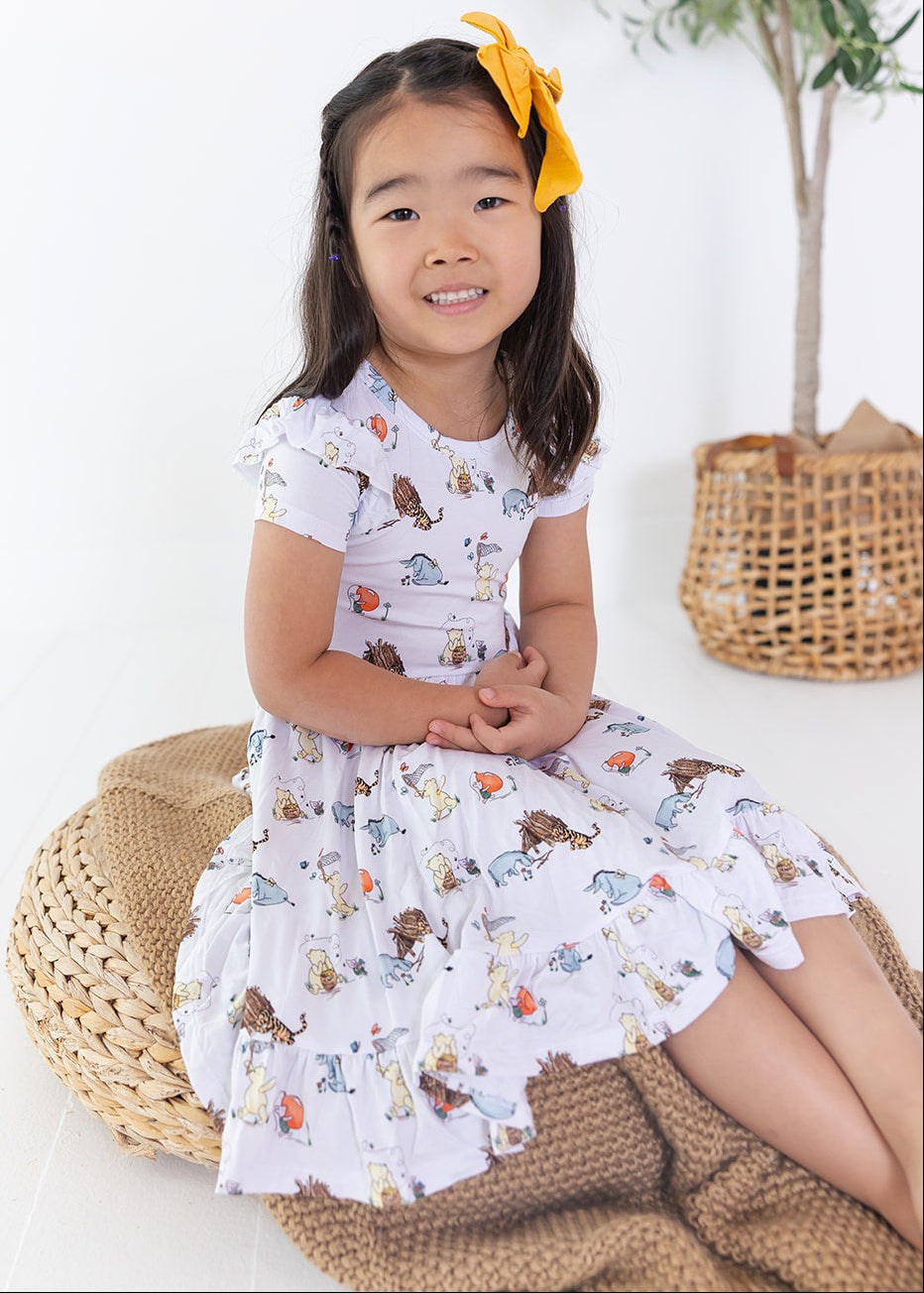 Little girl Winnie the Pooh bamboo twirl dress with matching shorts for Fall.